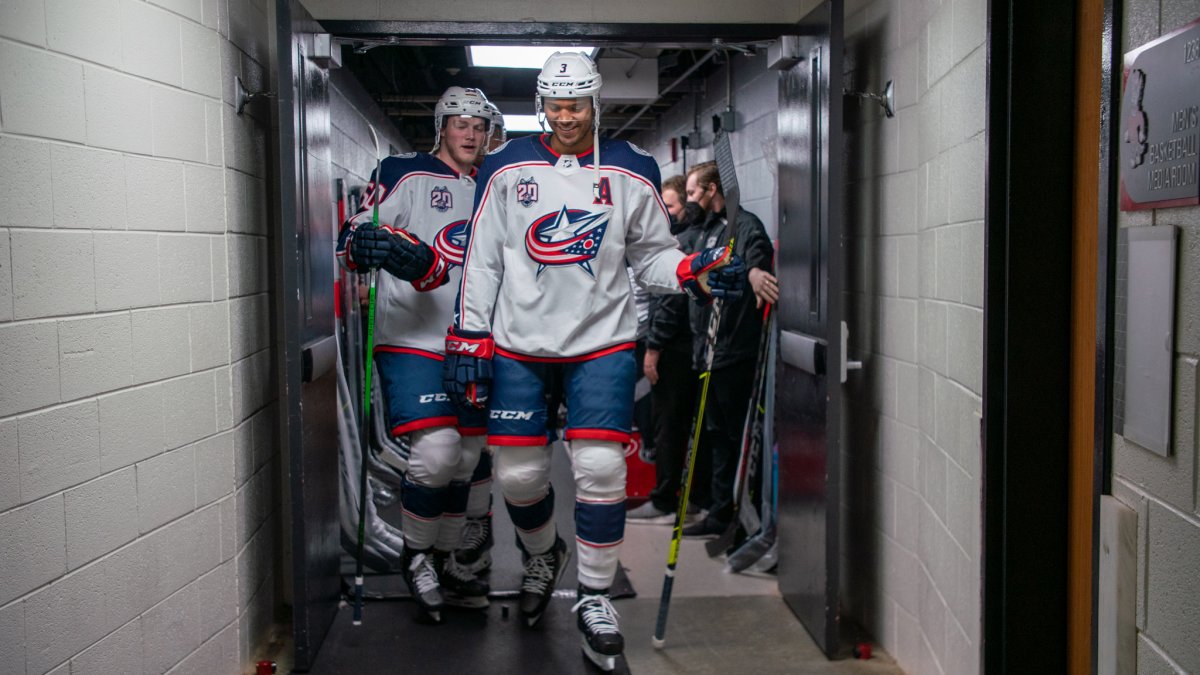 Seth Jones sports the white and navy combo before the Blue Jackets take the ice.