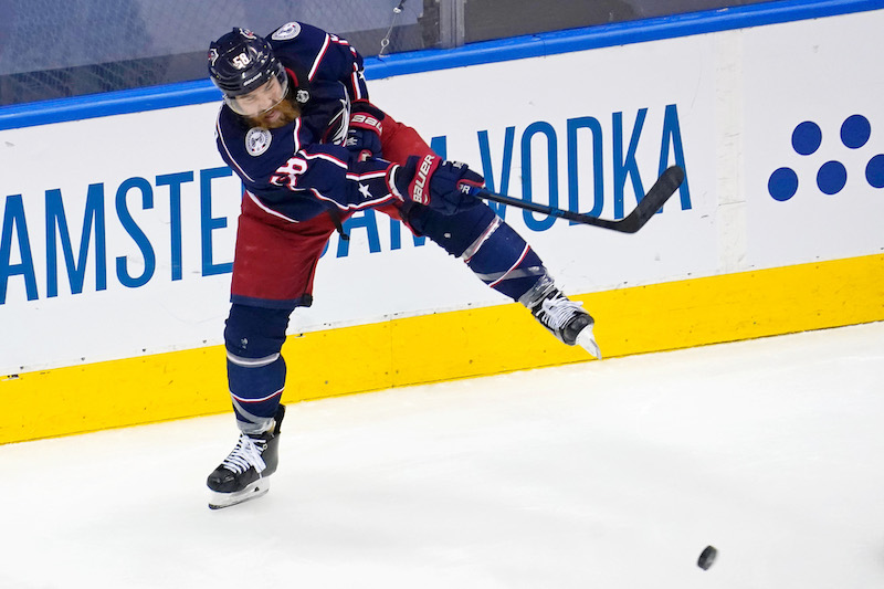 Columbus Blue Jackets' David Savard clears the puck against the Tampa Bay Lightning during the second period of game three of the first round of the 2020 Stanley Cup Playoffs at Scotiabank Arena.