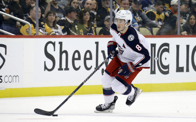 Columbus Blue Jackets' Zach Werenski skates with the puck against the Pittsburgh Penguins during the first period at PPG Paints Arena.