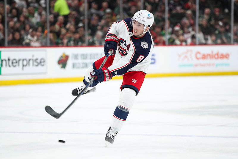  Columbus Blue Jackets' Zach Werenski shoots the puck against the Minnesota Wild in the first period at Xcel Energy Center.