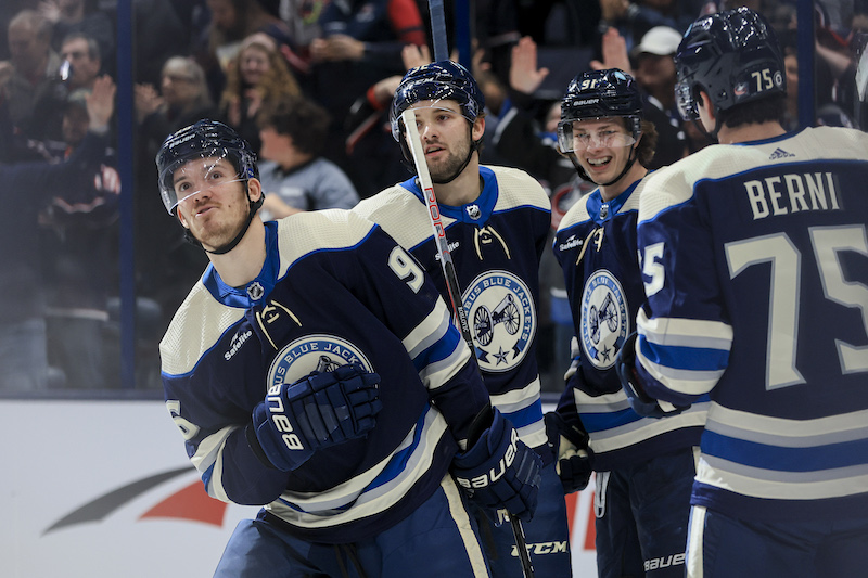 Columbus Blue Jackets' Jack Roslovic celebrates with teammates after scoring a goal against the Anaheim Ducks in the first period at Nationwide Arena.