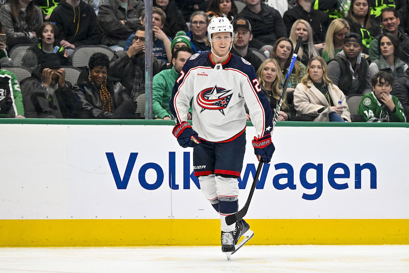 Columbus Blue Jackets' Adam Boqvist smiles after scoring a goal against the Dallas Stars during the third period at the American Airlines Center.