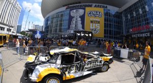 Outside of Bridgestone Arena, Predators' fans beat up on a Penguins car