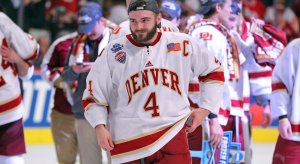 Will Butcher celebrates after the University of Denver won the NCAA National Championship