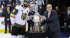 Vegas Golden Knights defenseman Deryk Engelland with NHL deputy commissioner Bill Daly