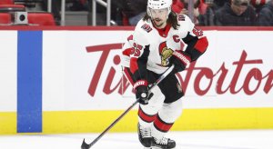 Erik Karlsson of the Ottawa Senators skates the puck up the ice