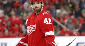 Henrik Zetterberg looks off into the distance before waiting for the puck to drop