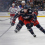 Eric Robinson gains control of a loose puck vs. the New York Rangers