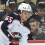 Columbus Blue Jackets center Luca Del Bel Belluz (65) moves the puck away from Pittsburgh Penguins defenseman Ty Smith (24) and forward Jonathan Gruden (45) during the first period at PPG Paints Arena.