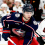 Columbus Blue Jackets center Adam Fantilli (11) shoots the puck as Chicago Blackhawks center Connor Bedard (98) trails the play during the first period at Nationwide Arena.