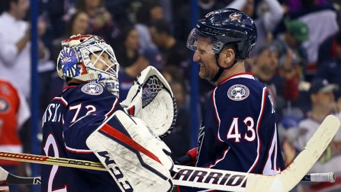 Sergei Bobrovsky and Scott Hartnell celebrate the Blue Jackets' 1-0 win over the Flyers