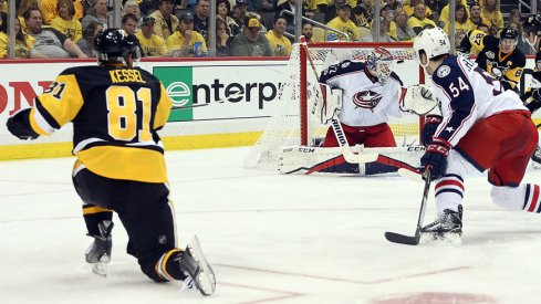 Pittsburgh Penguins right wing Phil Kessel shoots and scores over the glove of Columbus Blue Jackets goalie Sergei Bobrovsky.