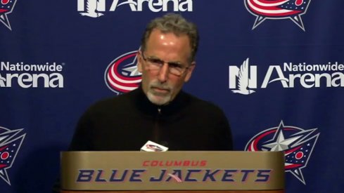 John Tortorella speaking at his end-of-season press conference.