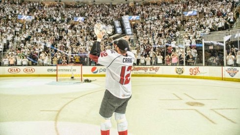 Ryan Craig celebrates his Calder Cup win with the Cleveland Monsters