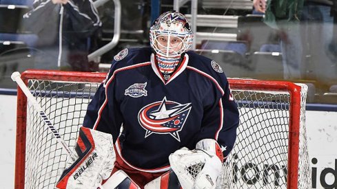 Oscar Dansk gets ready for the puck during the preseason.