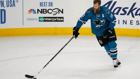 Joe Thornton skates with the puck during pregame warm ups