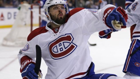 Alexander Radulov celebrating after scoring a goal.