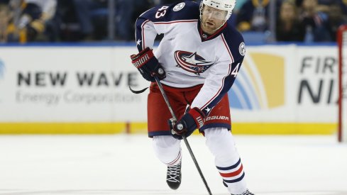 Scott Hartnell skates the puck up the ice.