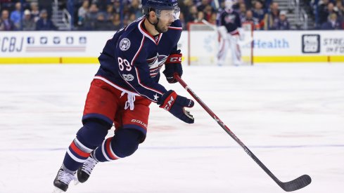 Sam Gagner skates the puck up the ice.