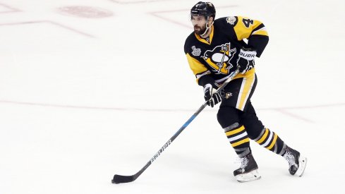 Justin Schultz skates the puck up the ice during the Stanley Cup Final.