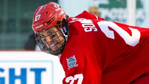 Doyle Somerby waits for the puck to drop while playing at Fenway Park