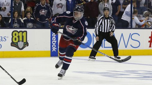 Zach Werenski passes the puck after getting injured during the Stanley Cup playoffs