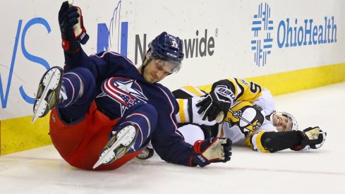 Doyle Somerby takes a tumble during a game against the Penguins