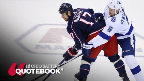 Brandon Dubinsky takes a check from Anton Stralman during the Blue Jackets 2-0 loss to the Tampa Bay Lightning.