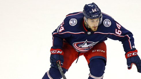 Tyler Motte skates with the puck during a game with the Columbus Blue Jackets