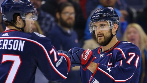 Nick Foligno and Josh Anderson fist-bump after a win over the New York Rangers