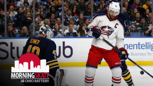 Nick Foligno sits net front hoping to score on Robin Lehner