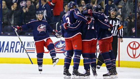 Nick Foligno celebrating with teammates