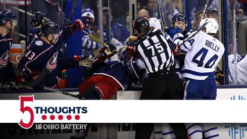 Matt Martin goes to grab Lukas Sedlak off of the bench during the run of play.