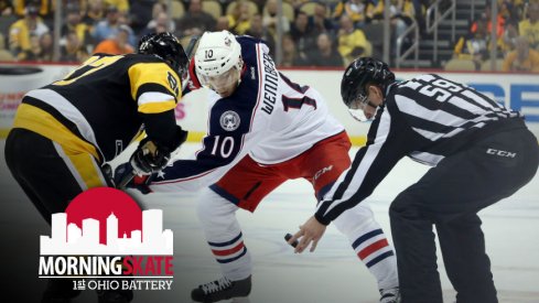 Alexander Wennberg fights for a faceoff against Sidney Crosby of the Pittsburgh Penguins