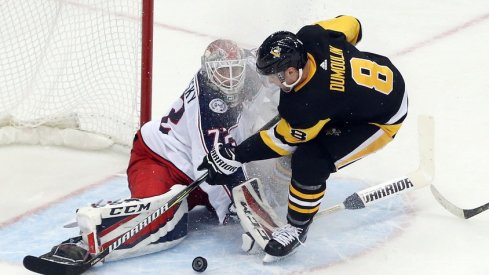 Brian Dumolin interferes with Sergei Bobrovsky during overtime