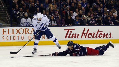 Markus Nutivaara dives to break up a Tyler Johnson opportunity.