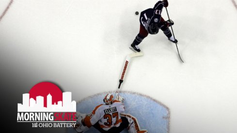 Cam Atkinson attempts to sneak one by Brian Elliott of the Flyers in the shootout