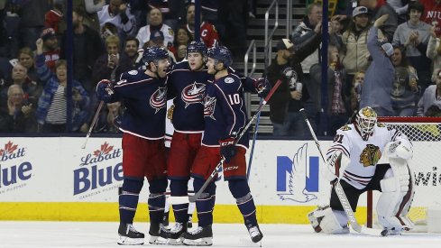 Josh Anderson celebrates with teammates