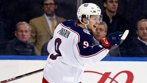 Artemi Panarin celebrates his hat trick against the New York Rangers