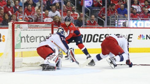 Sergei Bobrovsky and David Savard team up to defend the Blue Jackets' net.