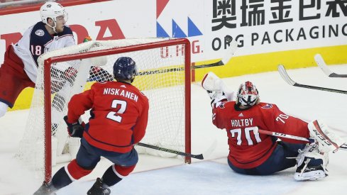 Pierre-Luc Dubois tries to put a puck past Braden Holtby during Game 5