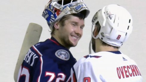 Sergei Bobrovsky and Alex Ovechkin in the handshake line.