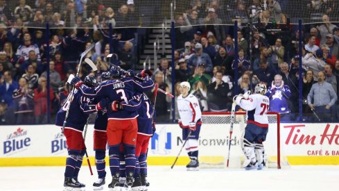 Blue Jackets celebrate a power play goal against the Washington Capitals