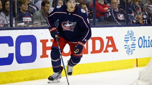 Zach Werenski tries skating with the puck during the Stanley Cup Playoffs