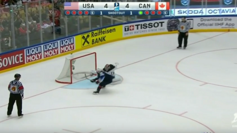 Cam Atkinson scores a backhanded goal against Canada to win the game.