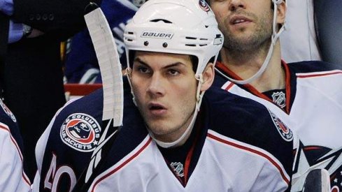 Jared Boll waits to get on the the ice during a game in 2011