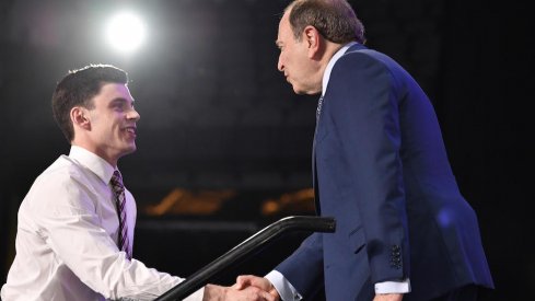 Blue Jackets first-round NHL Draft pick Liam Foudy meets NHL commissioner Gary Bettman.