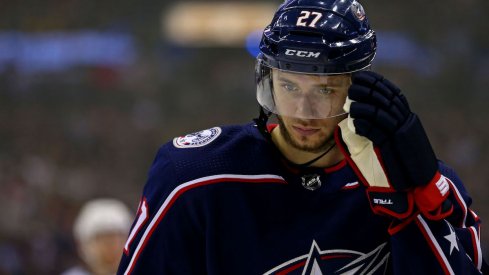 Columbus Blue Jackets defenseman Ryan Murray lines up before face-off during a game at Nationwide Arena.