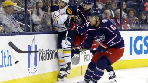 Columbus Blue Jackets defenseman Adam Clendening pursues the puck in a preseason game against the Buffalo Sabres at Nationwide Arena.