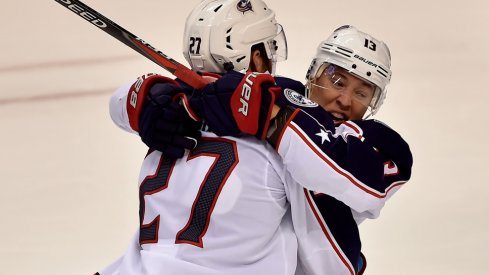 Cam Atkinson and Ryan Murray celebrate scoring against the Panthers